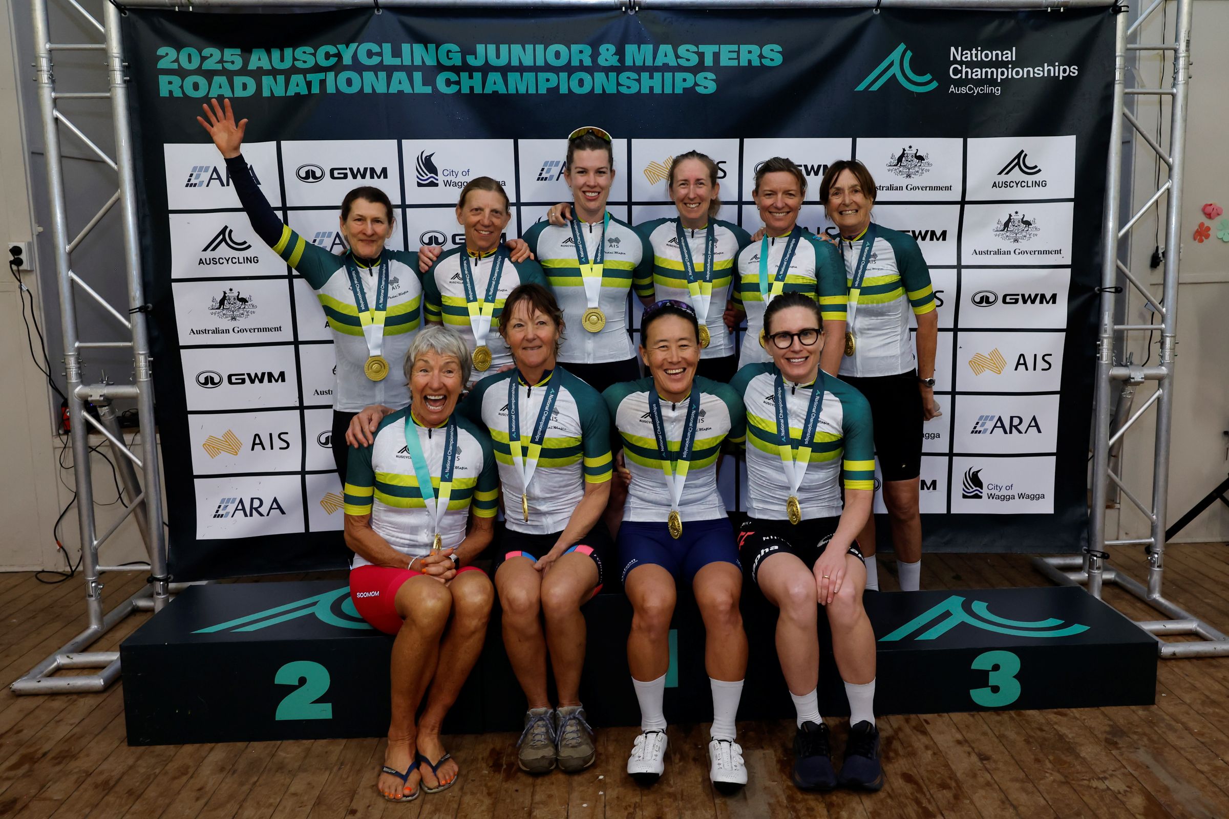 The women's masters road race national champions pose for a group photo at the 2025 AusCycling Junior & Masters National Championships in Wagga Wagga